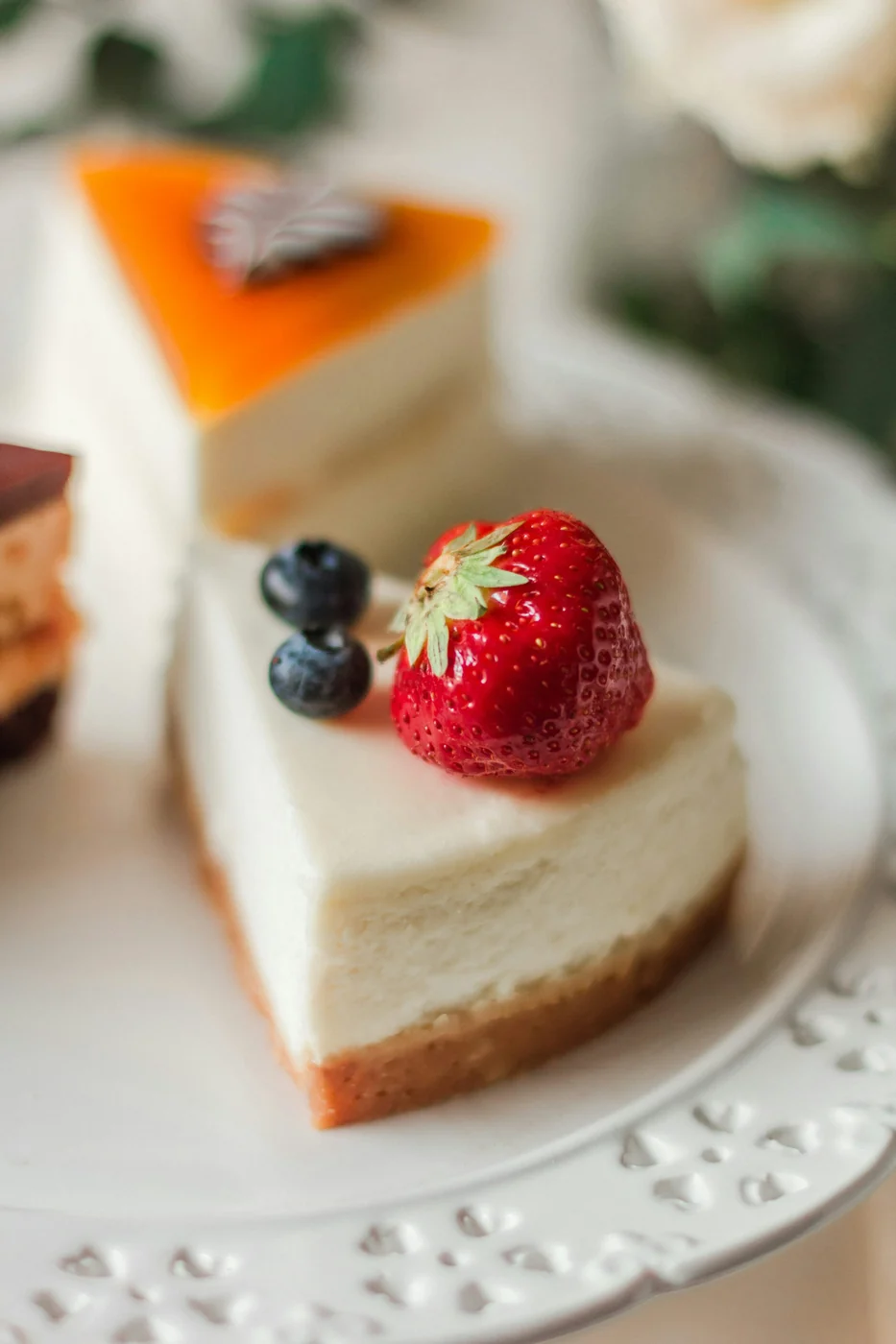 Creamy cheesecake topped with fresh strawberries