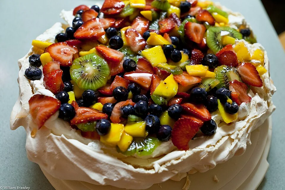 Pavlova with seasonal fruit serving inspiration