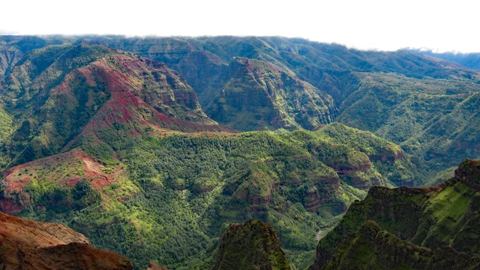 Red cliffs and green ridges in Waimea Canyon, Kauaʻi