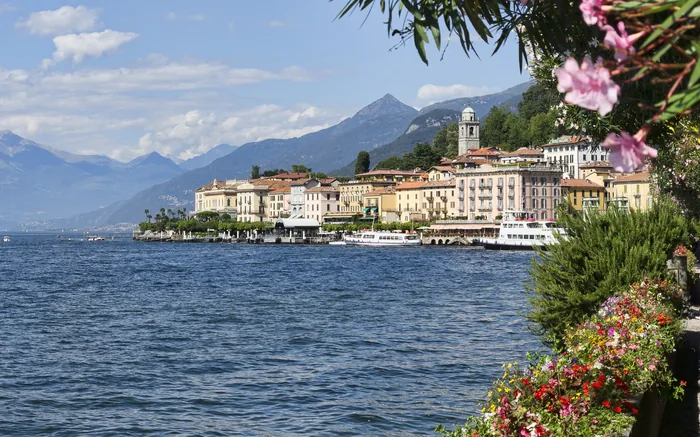 Bellagio’s waterfront framed by flowers on Lake Como