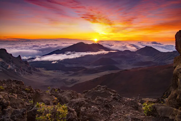Sunrise above the clouds at Haleakalā National Park, Maui